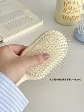 軽量でかわいい！頭皮マッサージ機能付きヘアブラシ【ポンポンスタイル・携帯便利】