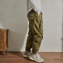 デザイン性のある束脚カジュアルパンツ【ミックスパターン・ルーズフィット・ボタン付き・トレンド】
