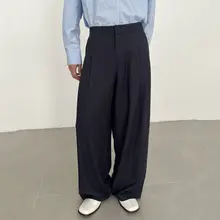 COLN ダークブルー スラックス