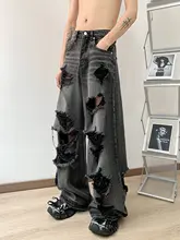 ストリートスタイルデザインのアシンメトリー破れデニムパンツ【ゆったりシルエット・夏用・ウォッシュ加工】