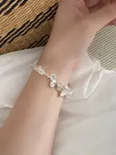 天然不規則な白水晶と真珠のブレスレット【バロックフラワーモチーフ・柔らかな雰囲気】