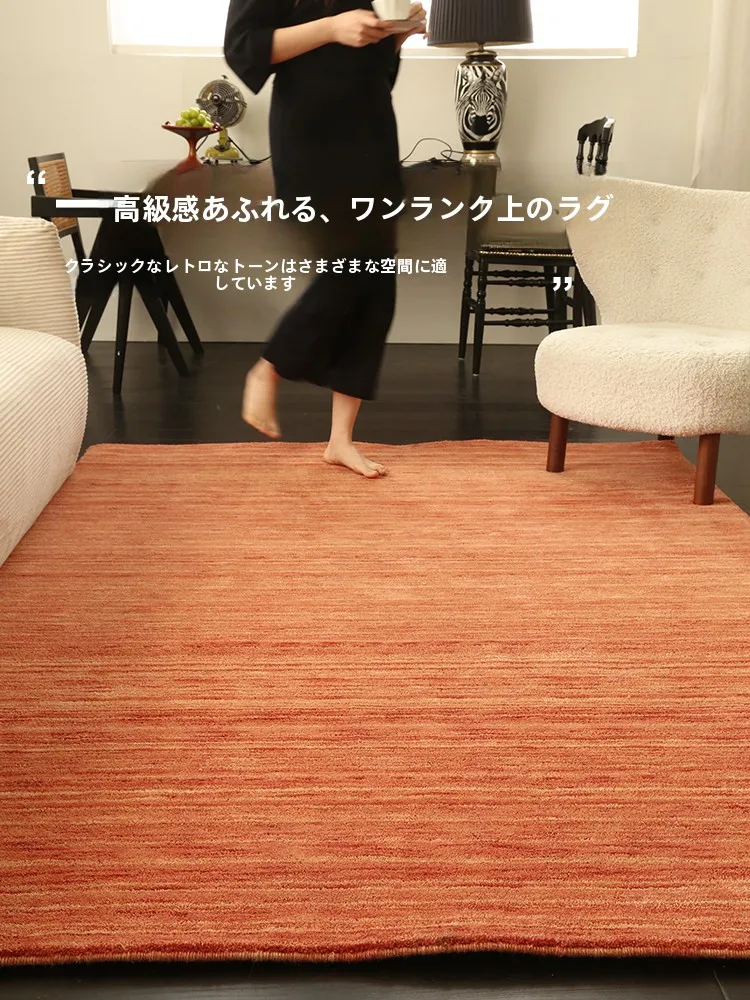 ピンクオレンジの純羊毛ラグ：現代輕奢風リビング用の高吸音性と防滑性能を実証