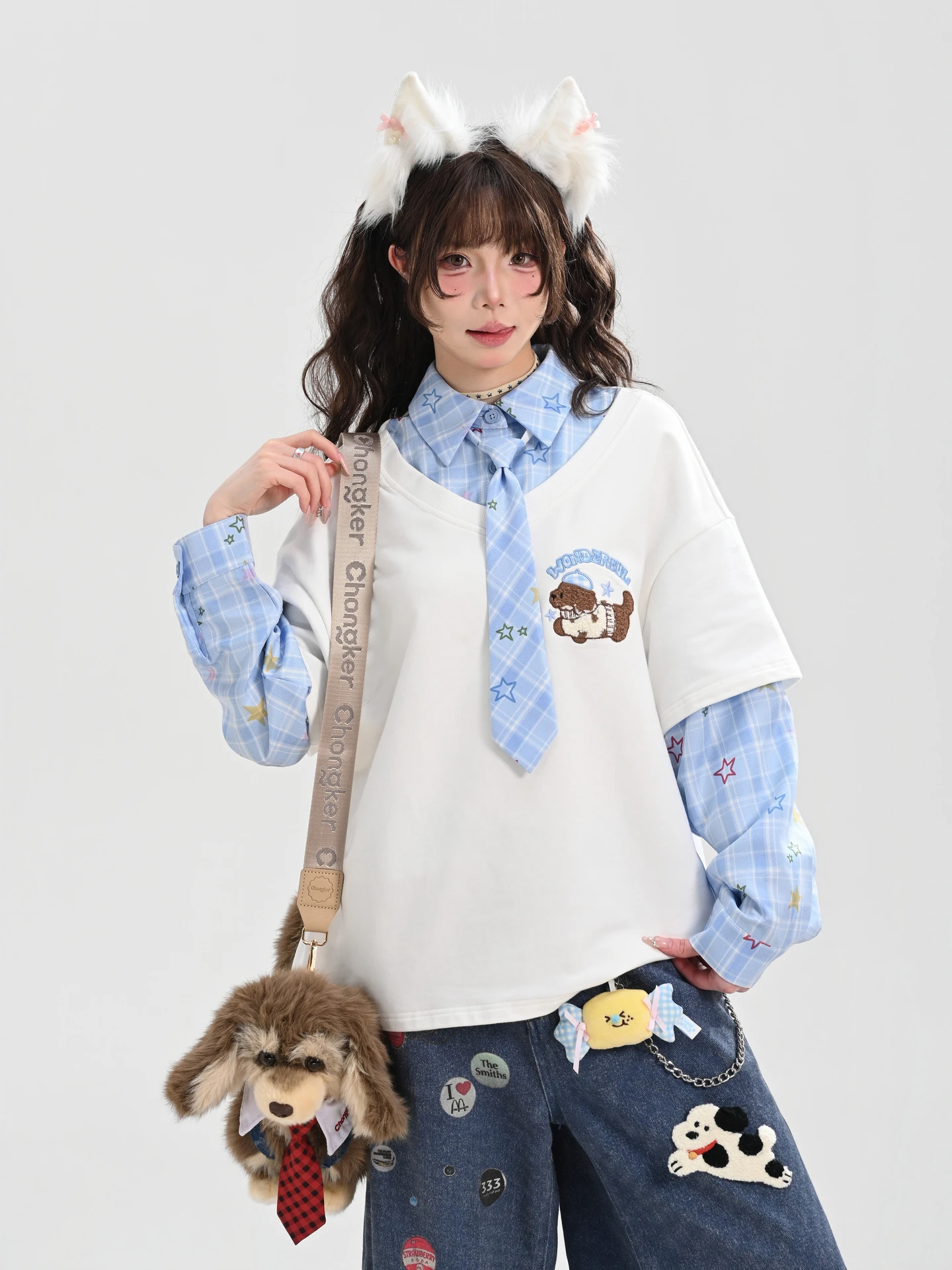 犬刺繍デザインのスウェットトップス：ゆったり感とデザイン性を両立した日常着の選択肢