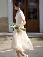 XWI エレガントな立体刺繍の夏用ワンピース【ウエスト絞り・天絲素材・ホワイト】