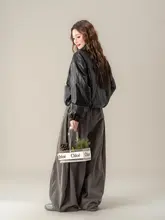 レトロなデザインの黒いスタンドカラーライダースジャケット【春用・ショート丈】