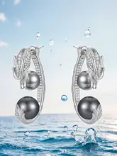 ドラゴンモチーフの中国風イヤリング【高級感・純銀製・パール風デザイン】