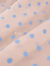 柔らかく透け感のある 肌色ベースのブルー天絲麻ドット柄生地【春夏用】