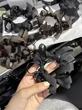 ハンドメイドの蝶結びヘアゴム【デザイナー作品・編み込み】【大人可愛い】