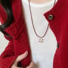 赤い紐の引き紐さくらんぼリボンペンダントネックレス【秋冬用・シンプルデザイン】
