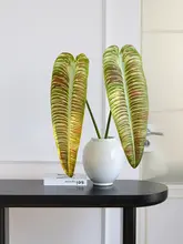ハイエンドの模擬植物は、火の鶴の王様の葉の緑の植物に感じられます