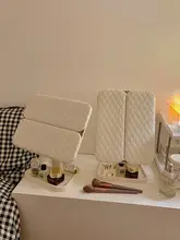 ハーフシェルデザインのLED化粧鏡【ライト付き・収納ボックス一体型・テーブル用・折りたたみ・調整可能】