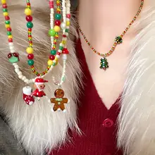クリスマスツリーとジンジャーブレッドマンのネックレス【秋冬用・女性用・デコレーションデザイン】