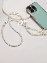 スタイリッシュなスマートフォン用ストラップ【手作り・耐久性・ビーズデザイン・リボンモチーフ】