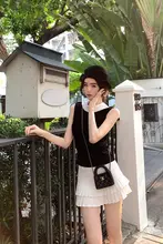 春季新作 膝上丈のプリーツスカート【中腰・フレアデザイン】