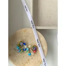 And Acc ボヘミアン風 カラフルビーズ 円形イヤリング【デザイン性のあるカラフルアクセサリー】