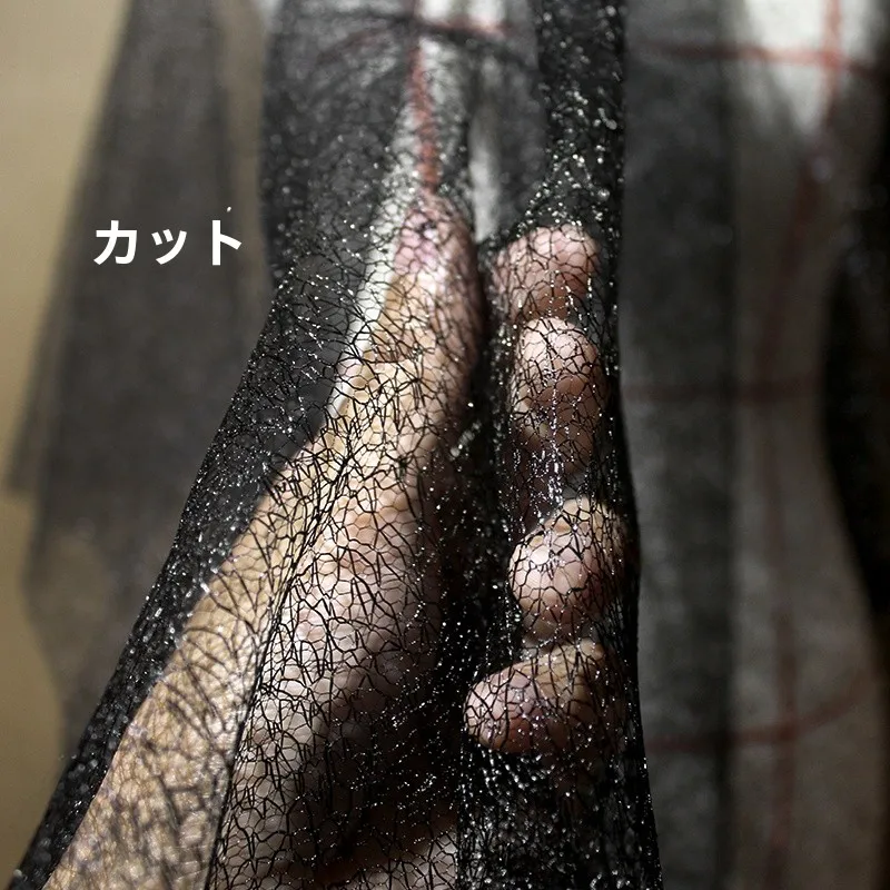 黒の不規則なテクスチャーチュール生地：高級ドレス制作に最適な網纱素材とは