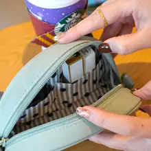 立体猫デザインの布製ポーチ【化粧品収納・おしゃれな手持ちバッグ】