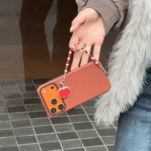 独特なデザインのマグネット式スマホケース【ストラップ付き・iPhone対応・女性向け】