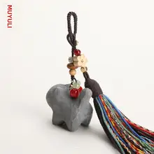 手作り木彫りの小さな青い猫のキーホルダー【バッグやリュックに最適】