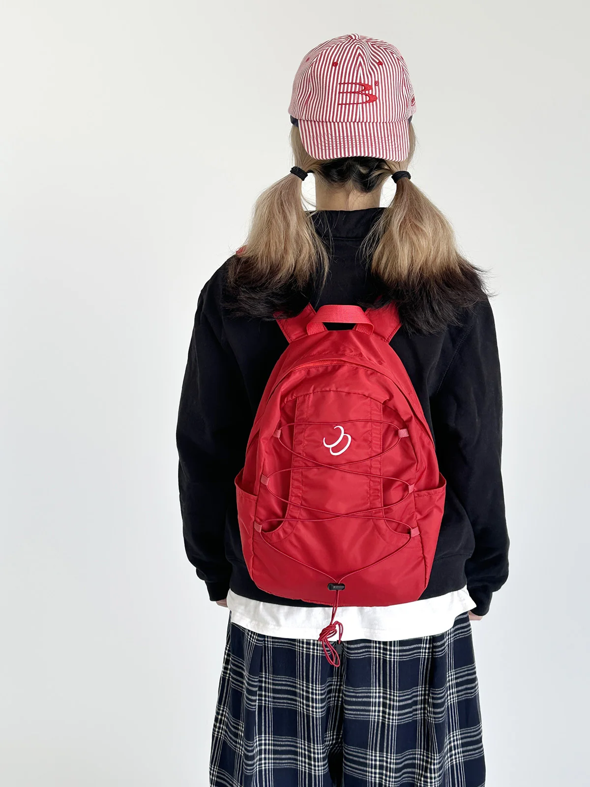 赤のパッチワークリュックサック【お年玉用】：おしゃれで実用性と機能性を両立するデザインの選択