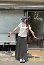 ストライプデザインのロングスカート【カジュアル・リボン付き・フレアシルエット・ボディラインを美しく見せる】