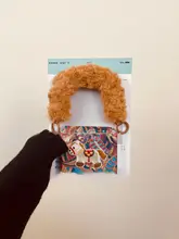 フリップフォン用ケース【全包デザイン・赤いカシューナッツ柄・刺繍入り・持ち手付き】