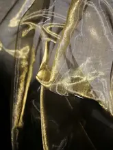 透け感のある金色のオーガンザ生地【華やかなウェディングドレス・和服・子供服デザインに最適】