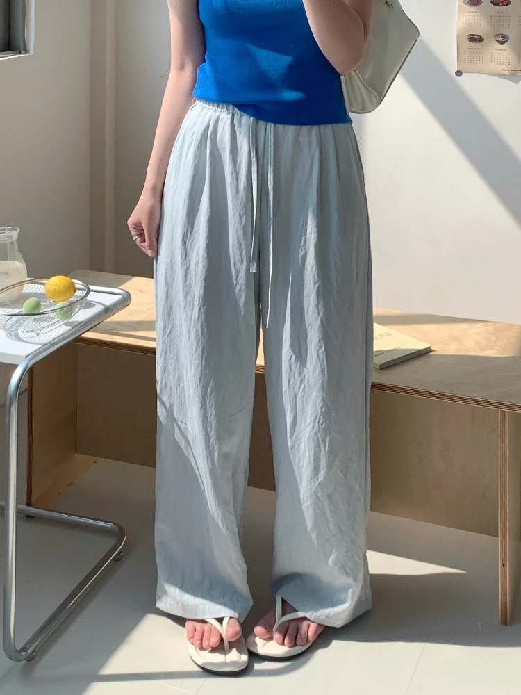 白色ゆったりカジュアルハイウエストワイドパンツ：夏用の通気性と百搭性を実証