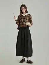 洗練されたデザインのブラックAラインスカート【通勤用・高級感】