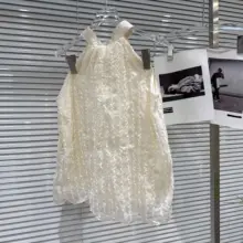 甘美な印象のリボン付きハーフネックトップスとパンツスカートのコーディネート（セットアップ対応）