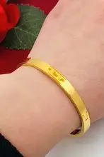 コインデザインのハードブレスレット【金色仕上げ・暗いバックル・四叶草モチーフ・流星雨デザイン】
