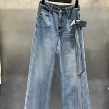 サイドリボン付きデザインのブルー ワイドデニムパンツ【極上の柔らかさ・春夏向け】