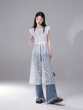 おしゃれなデザインのフリンジ付きブーツカットデニムパンツ【ミディアムブルー・トレンドファッション】