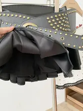 美式ストリートスタイルのスタッズ付きレザースカート【Aライン・ウエスト低め・ひざ上丈】
