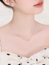微笑みリボンデザインネックレス【女性用・ラグジュアリー感・バタフライ結び・おしゃれアクセサリー】