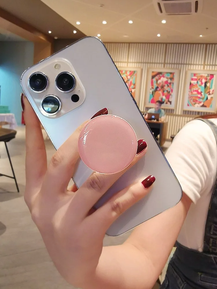 カラフルなマカロン風デザインの伸縮式スマホホルダー【折りたたみ・粘貼式】