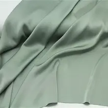 豆緑の麻サテン生地【微ストレッチ・光沢感あり・ドレス用】