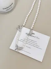 気品あるデザイン！パール付きリボンネックレス【シルバー・鎖骨チェーン】