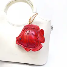 手作り牛革製の北欧スタイルキーホルダー【平安魚デザイン・車用・革製】