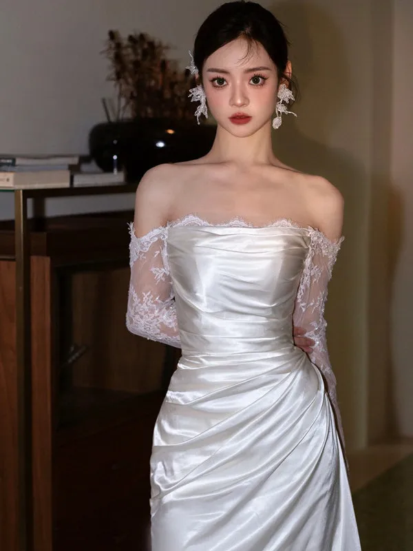 結婚式ゲストワンピースのデザイン例：フランス風白フィッシュテールレースドレス