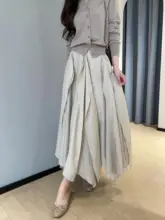 デザイン性のある不規則な裾の中長丈Aラインスカート【アセテート・女性用・春夏】