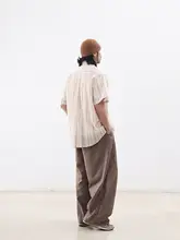 NOEARS 夏らしい若々しい気分を演出するアプリコットカラーの縦縞 シャツ