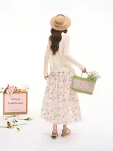 透かし編みデザインのウールカーディガン【春夏用・女性向け・魅力的なシルエット】