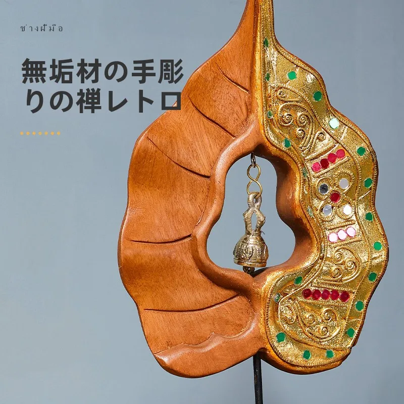 タイ製木彫り工芸品ボーディ葉デザイン：世界の民芸品としての価値と実用性