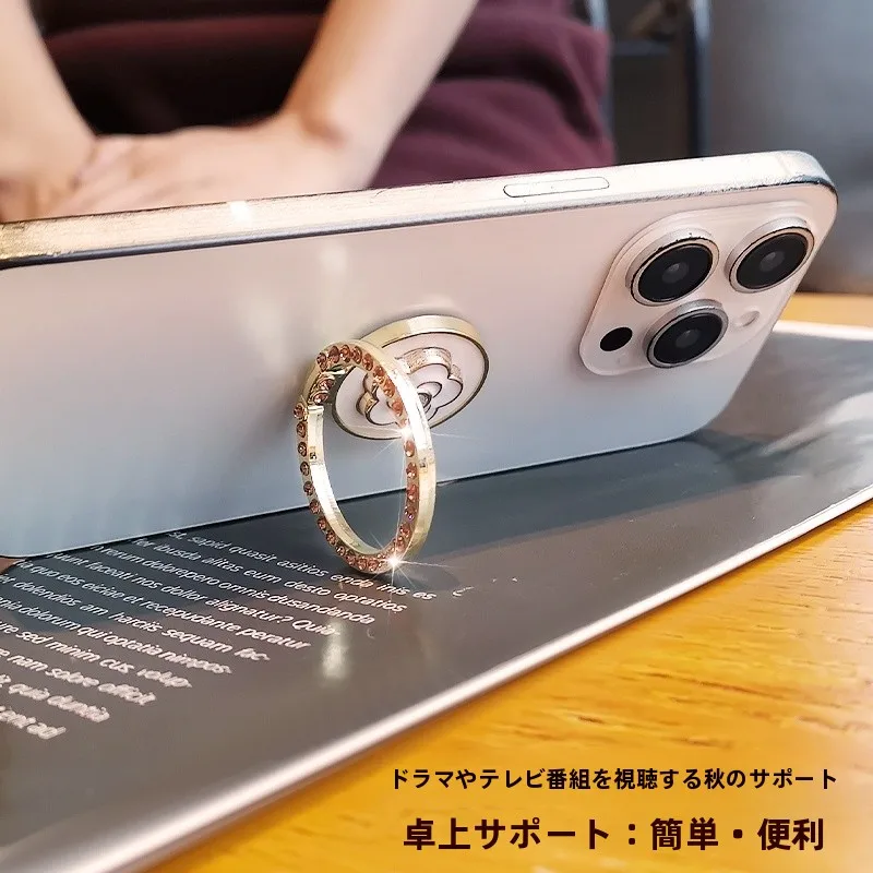 水晶デザインのスマホリングスタンド：粘貼式で安定した動画視聴に最適な置き型ホルダー