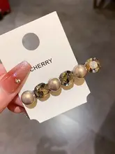 エレガントなパールヘアクリップ【ビジュー付き・サイド留め・韓国風】