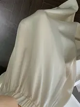 艶やかなサテン生地のひざ丈スカート【Aライン・フレアデザイン・春秋用】