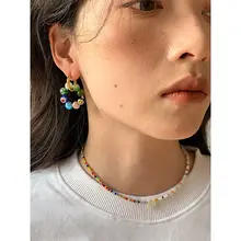 And Acc ボヘミアン風 カラフルビーズ 円形イヤリング【デザイン性のあるカラフルアクセサリー】