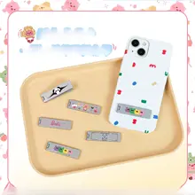 折りたたみ式スマホスタンド【金属製・背面貼り付け・デスク用・汎用】