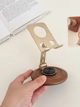 レトロな木目デザインの折りたたみ式スマホスタンド【360度回転・持ち運び便利】